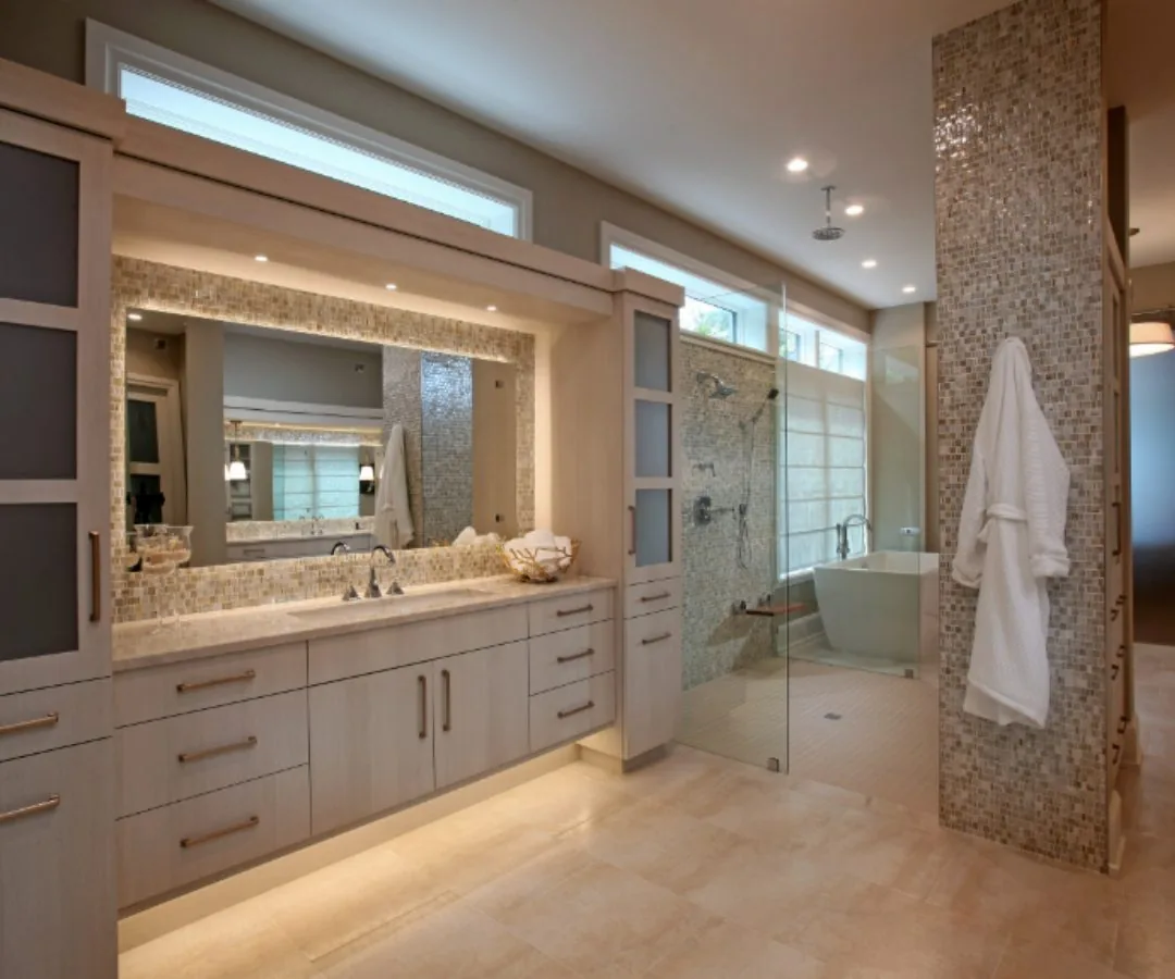 Floating master bath vanity with LED underlighting by Eurotech Cabinetry